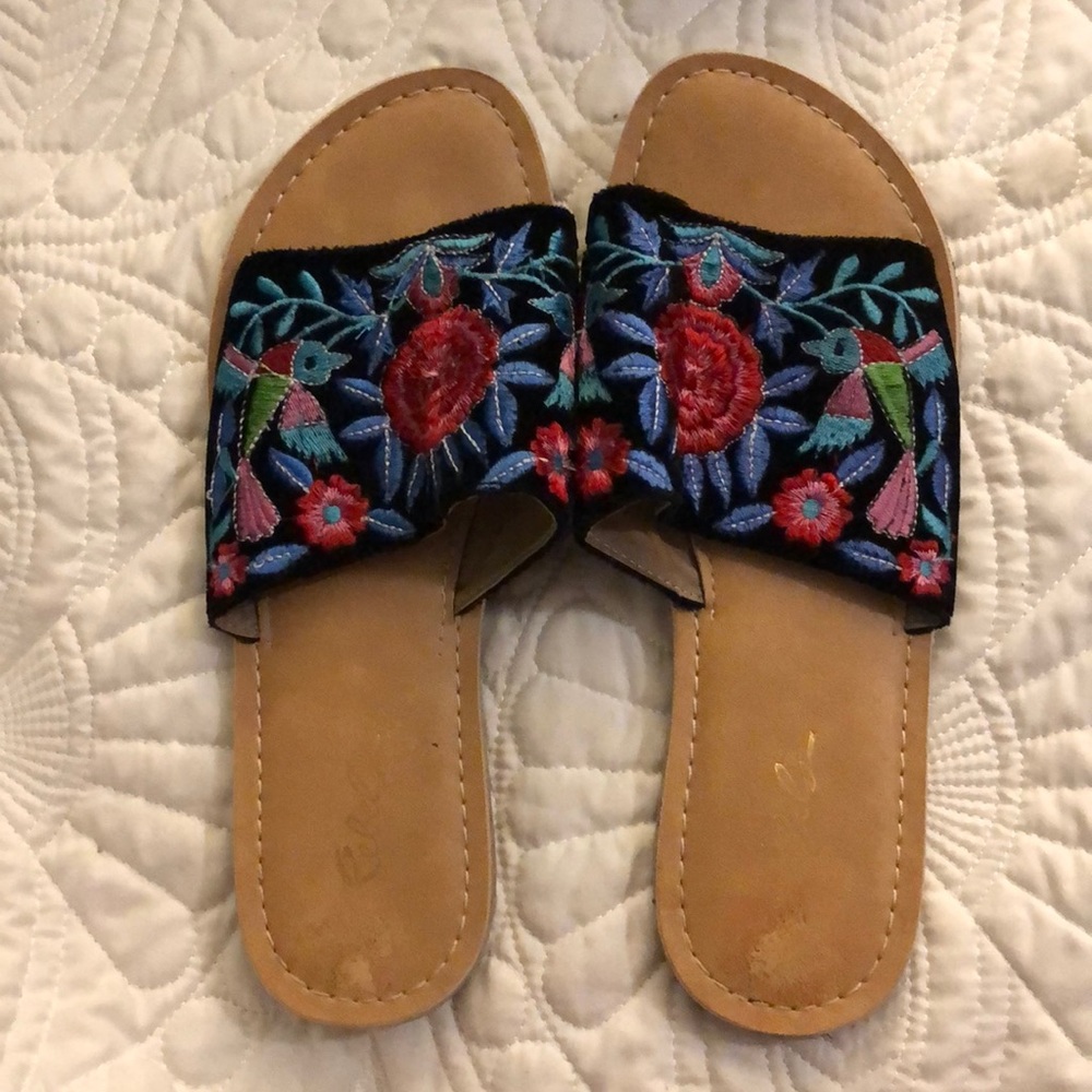 Black slide on sandals